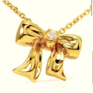 Retired Tiffany and Co. 18K Bow & Tiffany Diamond!